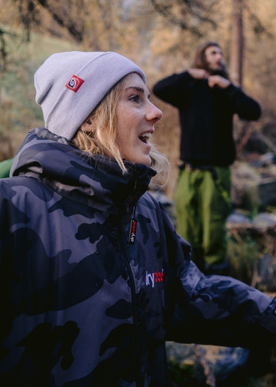 dyrobe® ambassador Lucy Campbell smiling wearing dryrobe® Eco Beanie