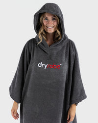 Woman wearing Slate Grey Organic Towel dryrobe® with hood up