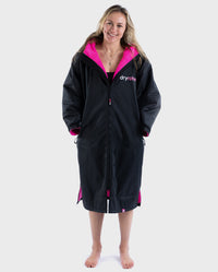 Woman wearing Black Pink dryrobe® Advance Long sleeve zipped up