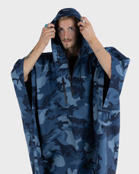 *MALE* wearing  Blue Camo dryrobe® Waterproof Poncho  with hood up 