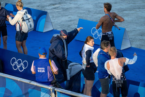 Mixed team triathlon event at the Paris 2024 Gamed with a swimmer wearing a Dryrobe as they prepare to get in the water