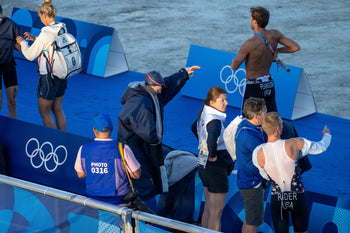 Mixed team triathlon event at the Paris 2024 Gamed with a swimmer wearing a Dryrobe as they prepare to get in the water