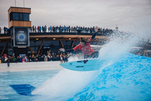 A surfer on a wave at SURFTOWN wavepool in Munich 