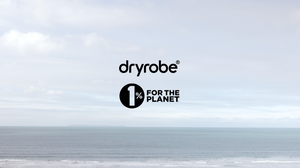 The dryrobe and 1% for the Planet logos displayed in black text over a background image of a calm sea and a cloudy, bright sky.