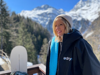 Jenny Jones wearing a dryrobe Advance in the mountains