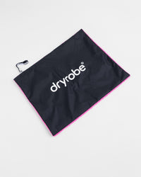 Studio flat shot of Dryrobe® black pink cushion cover 