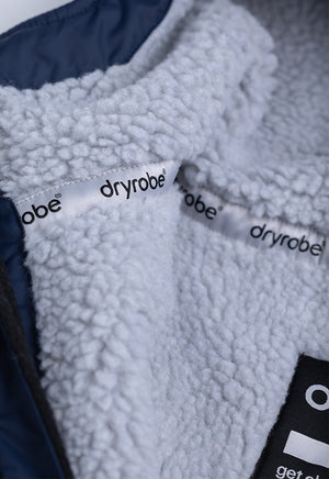 Close-up of a textured fabric with 'Dryrobe®' branding.
