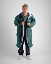*MALE* in studio wearing AW25 Green Dryrobe® advance long sleeve 