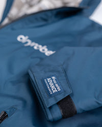 *MALE* Studio detail shot of AW25 Blue Dryrobe® advance long sleeve 