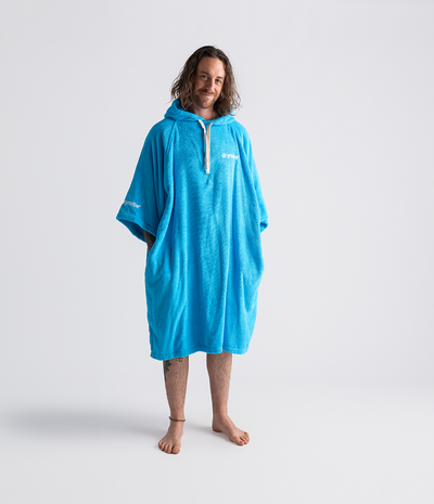 *MALE* Person wearing a blue hooded towel robe on a white background