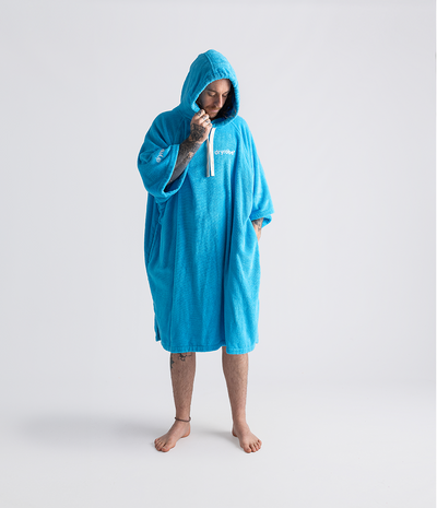 *MALE* Person wearing a blue hooded towel robe on a white background