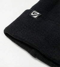 Black knit beanie with a logo on a light gray background