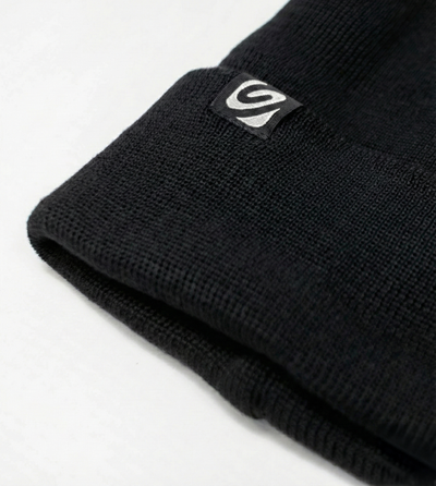 Black knit beanie with a logo on a light gray background