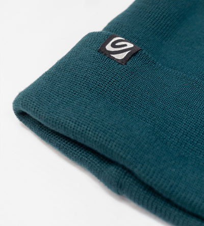 Flat studio shot of deep sea blue Dryrobe® Beanie hat 