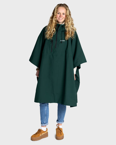 Female Adult wearing Dryrobe® poncho Green in studio