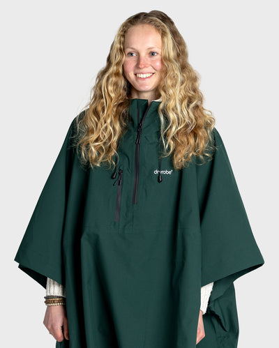 Female Adult wearing Dryrobe® poncho Green in studio