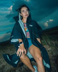 Female on dunes wearing Tech-Lite Dryrobe®