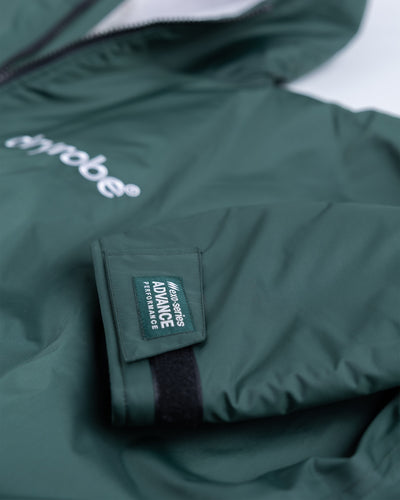*MALE* Studio detail shot of AW25 Green Dryrobe® advance long sleeve 