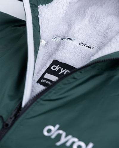*MALE* Studio detail shot of AW25 Green Dryrobe® advance long sleeve 