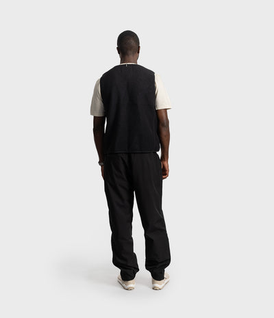 *MALE* Person wearing a patterned outfit on a white background