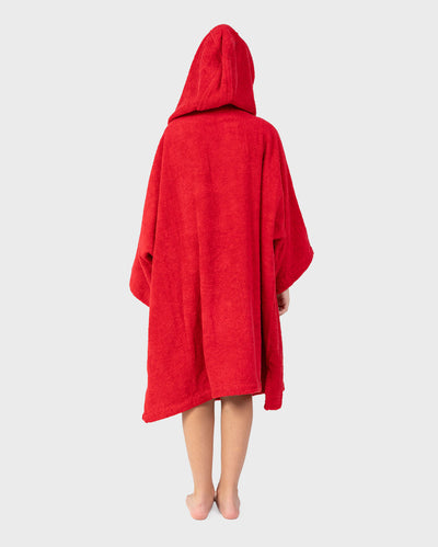 Child with back to the camera wearing Kids Organic Towel dryrobe - Remix in Red Black with hood up 
