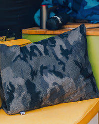 Dryrobe® black camo cushion cover in campervan