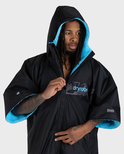 Adult Male in studio wearing black blue remix Dryrobe®