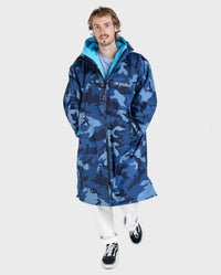 **MALE** Man walking toward 
camera wearing dryrobe Advance Long Sleeve changing robe in Blue Camo Blue