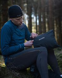 *MALE* in woods unpacking Tech-Lite Dryrobe®
