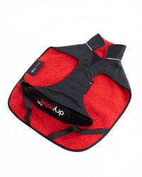 Red and black dog vest with 'Dryrobe Dog' branding on a white background