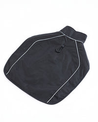 Black dog coat with white piping on a white background