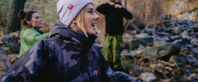 dyrobe® ambassador Lucy Campbell smiling wearing dryrobe® Eco Beanie