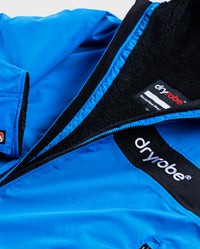 Close up of zip and lining on Cobalt Blue Black dryrobe® Advance Long Sleeve REMIX Range