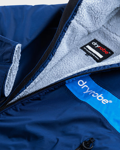 Close up of logo on dryrobe Advance Long Sleeve REMIX Range change robe in Navy Grey Cobalt 
