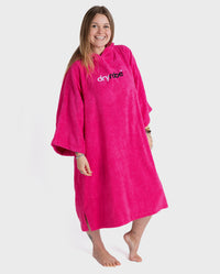 Woman wearing Pink Organic Towel dryrobe® with hood up