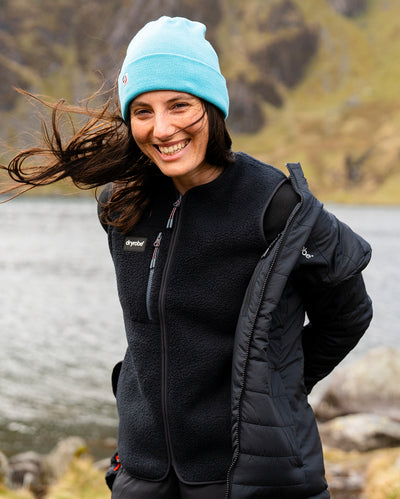 Female wearing Dryrobe® fleece gilet underneath Dryrobe® mid-layer jacket 