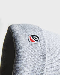Close up of wave symbol on Grey dryrobe® Eco beanie 