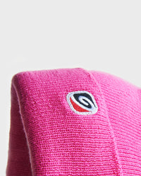 Close up of wave symbol on Pink dryrobe® Eco beanie 