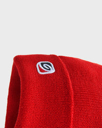 Close up of wave symbol on Red dryrobe® Eco beanie 