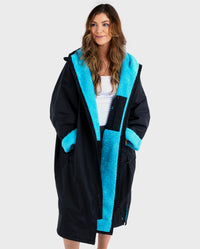 Woman wearing Black Blue dryrobe® Advance Long Sleeve unzipped