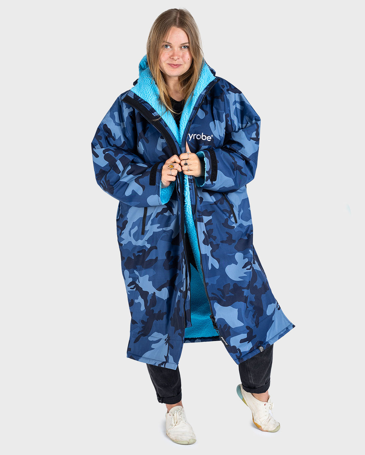 Woman wearing dryrobe Advance Long Sleeve change robe in Blue Camo Blue 