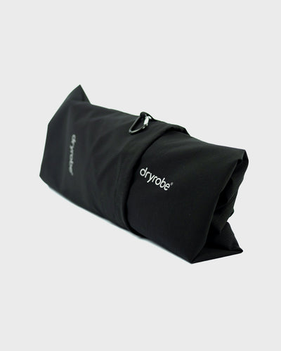 Black dryrobe® Waterproof Poncho inside stash bag