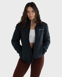 Woman wearing dryrobe® Mid-layer Jacket unzipped