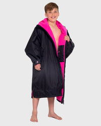 Boy wearing Black Pink dryrobe® Advance Kids Long Sleeve 