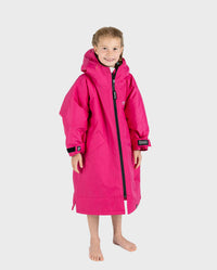 Child wearing dryrobe Advance Long Sleeve changing robe in Pink Light Grey