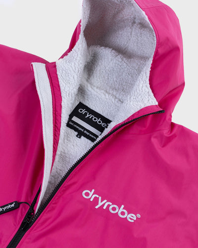 Close up of logo on dryrobe Advance Long Sleeve Changing robe in Pink Light Grey 