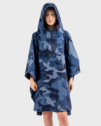 Girl wearing Blue Camo Kids dryrobe® Waterproof Poncho with hood up 