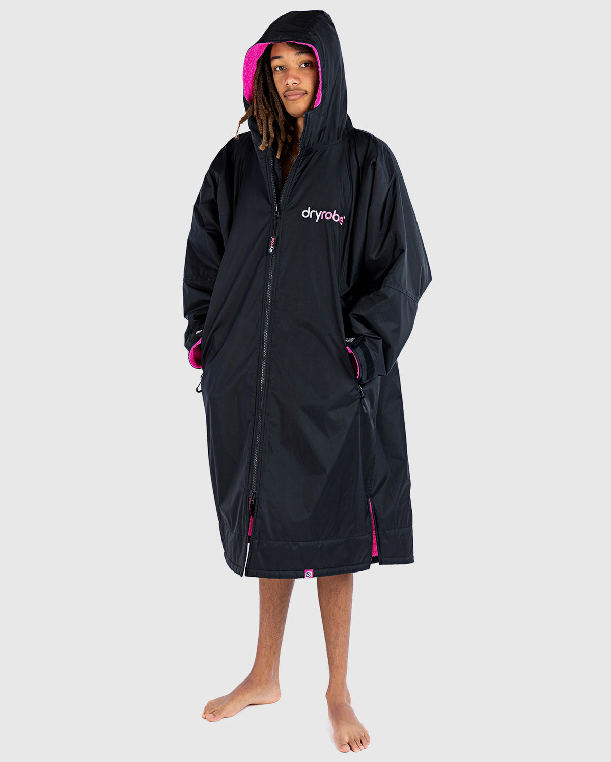 *MALE* wearing Black Pink dryrobe® Advance Long Sleeve with the hood up