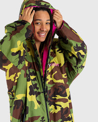 *MALE* wearing Camo Pink dryrobe® Advance Long Sleeve with the hood up