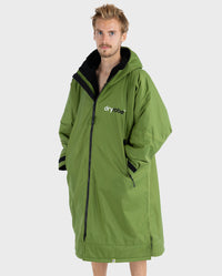 *MALE* wearing Forest Green dryrobe® Advance Long Sleeve, zipped up 